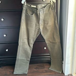 Worn men’s Gap olive green colored jeans, size 33x30